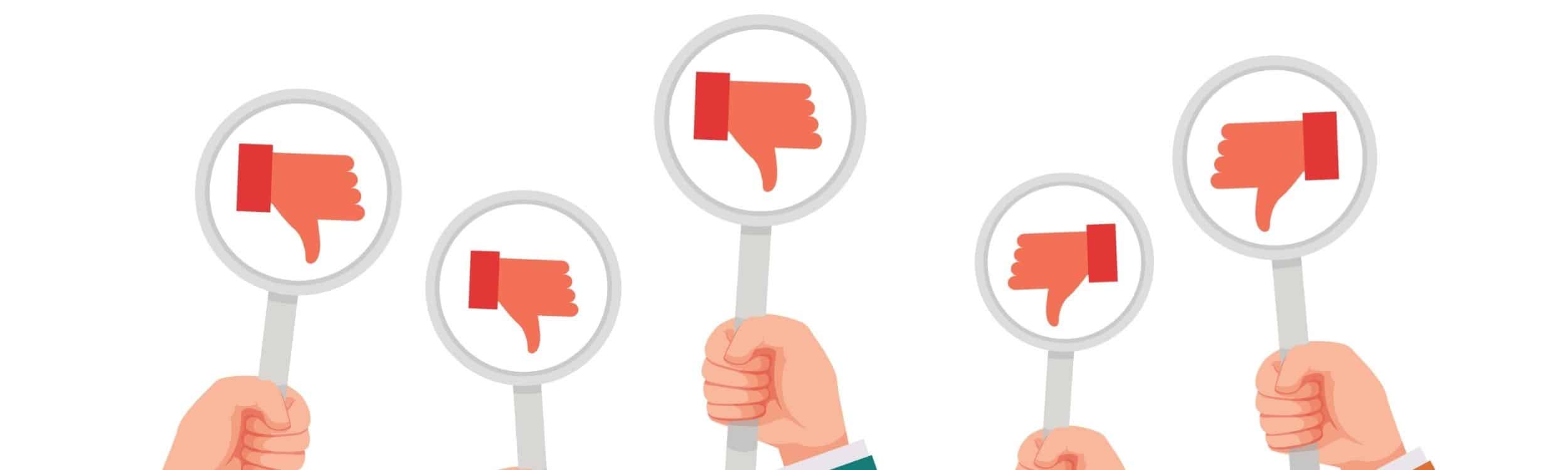 a series of thumbs down symbols coming from negative customer reviews