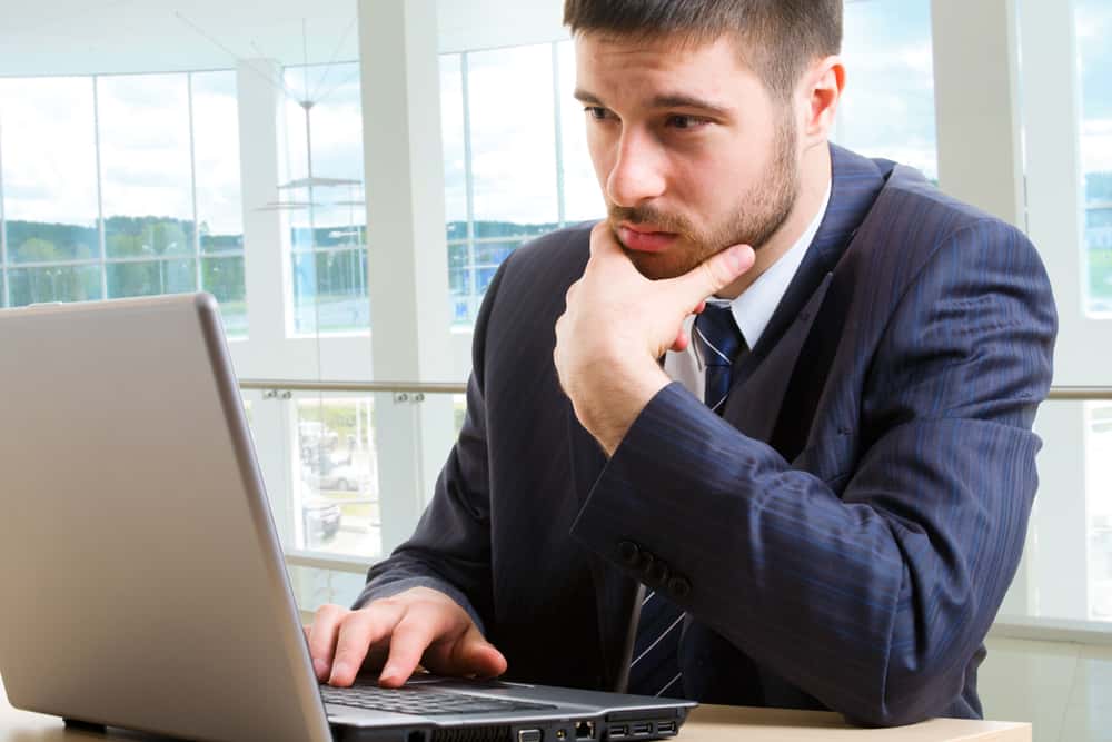 man on computer